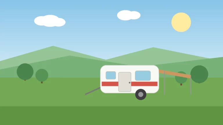 kamperen met caravan op een groene camping