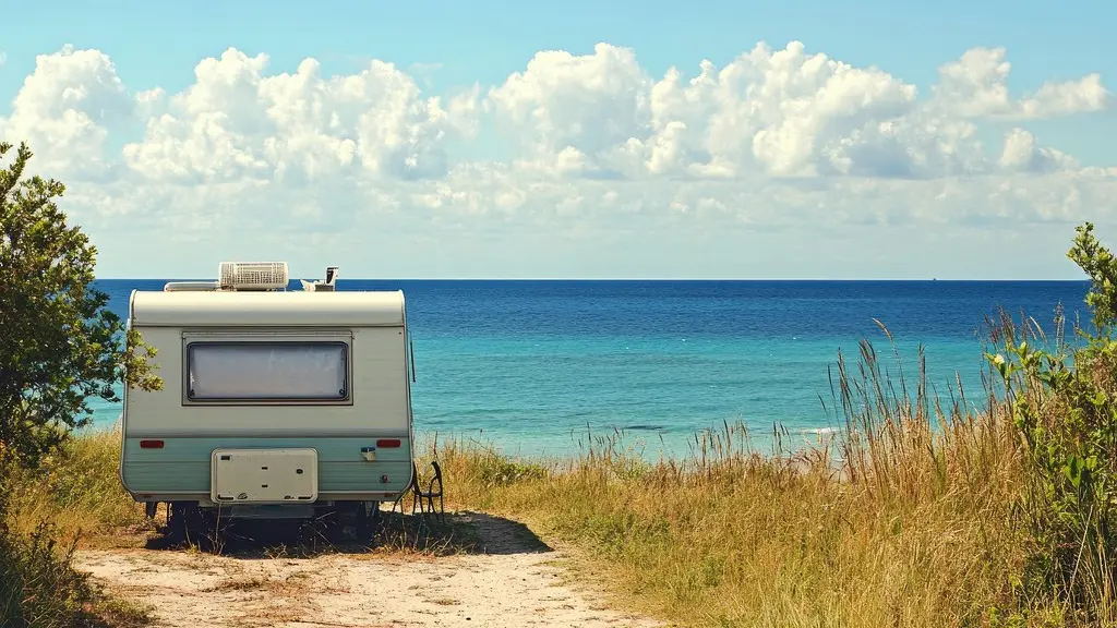 5 sterren camping: caravan op een kampeerplaats aan zee